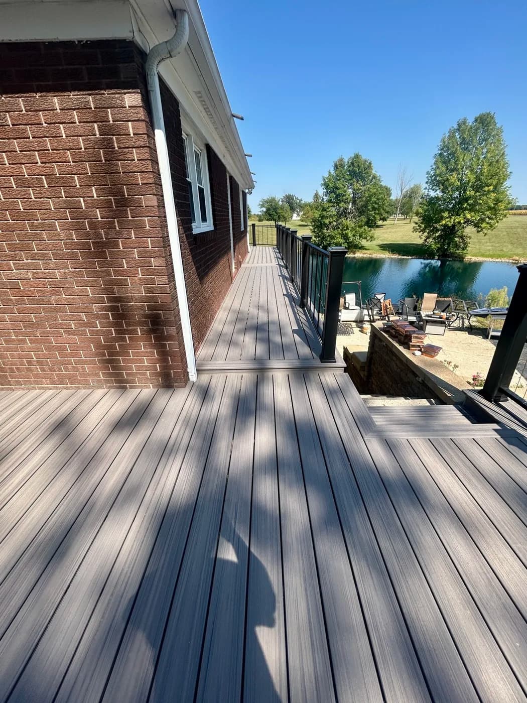 Composite deck railing detail along a lakefront home